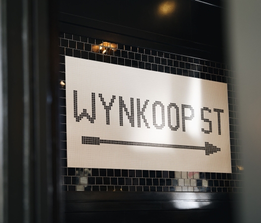 Wynkoop St Sign in Terminal Bar