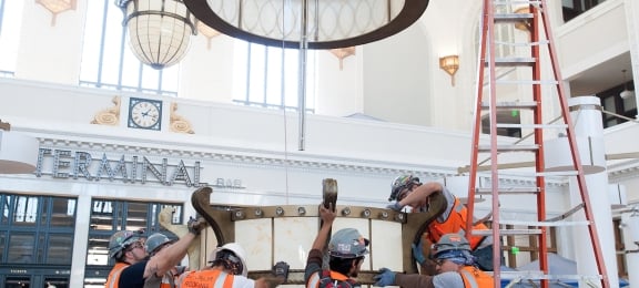 Planning to install the Great Room chandeliers at Denver Union Station