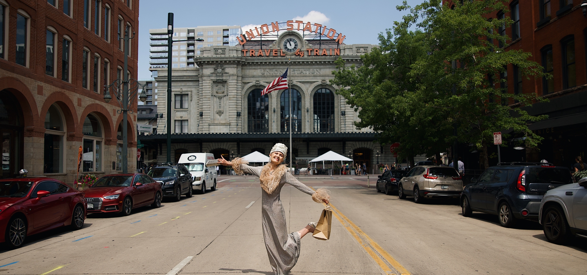 Woman in sparkly dress outside of Denver Union Station